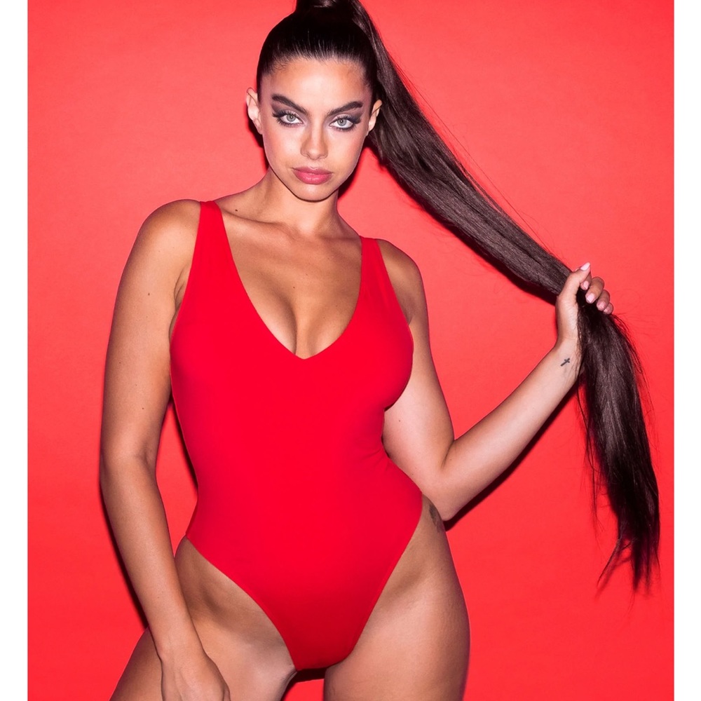 NWOT TA3 “hi-cut plungey” Swimsuit in red.